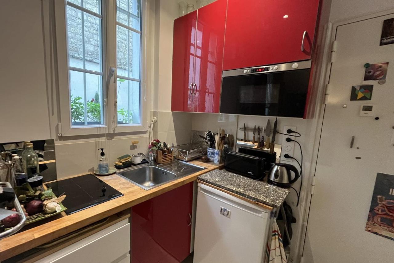 Charming Apartment In The Heart Of Parigi Esterno foto